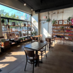 Sun shining through the windows into the interior of the art gallery in Red Tree Coffee and Art in Oakley